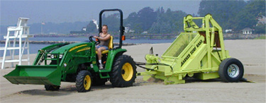 tractor cleaning on beach